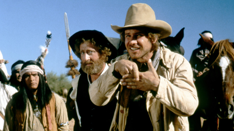 Tommy doing a magic trick as a skeptical Avram looks on in The Frisco Kid (1979)