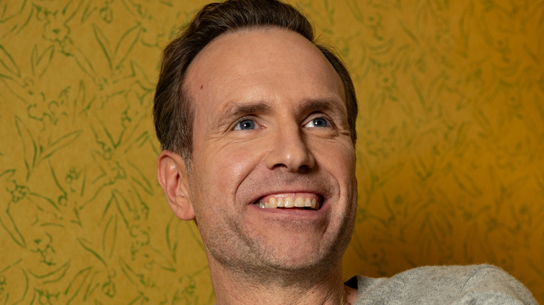 Rafe Spall smiling