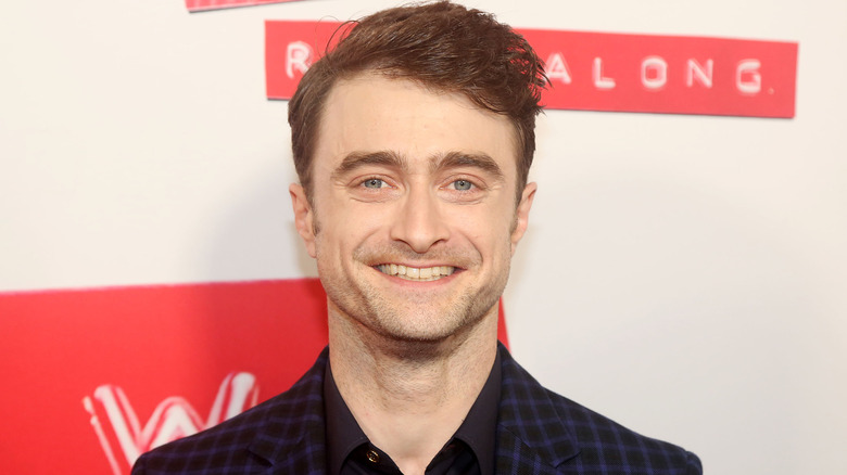 Radcliffe smiling on the red carpet