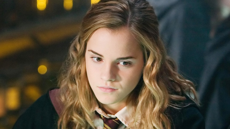 Hermione frowning looking down