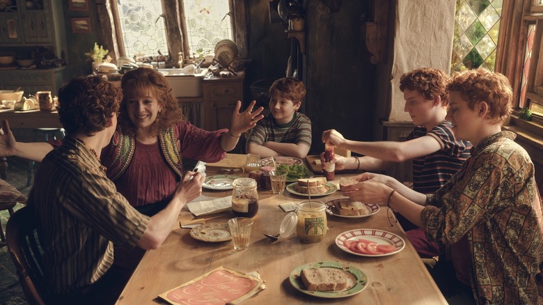 Molly about to hug Percy at the breakfast table with Ron, Fred, and George in Harry Potter and the Philosopher's Stone (2026)