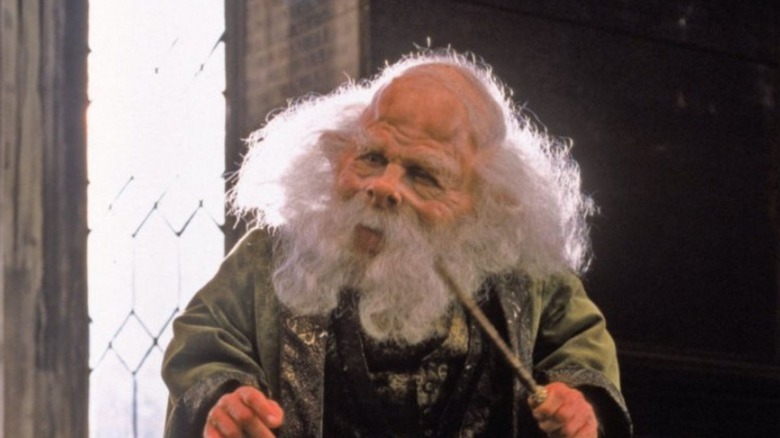 Professor Flitwick holding his wand in Harry Potter and the Sorcerer's Stone