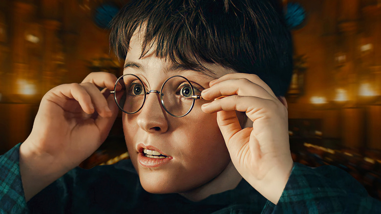 Harry Potter looking amazed in front of Hogwarts background (2026)