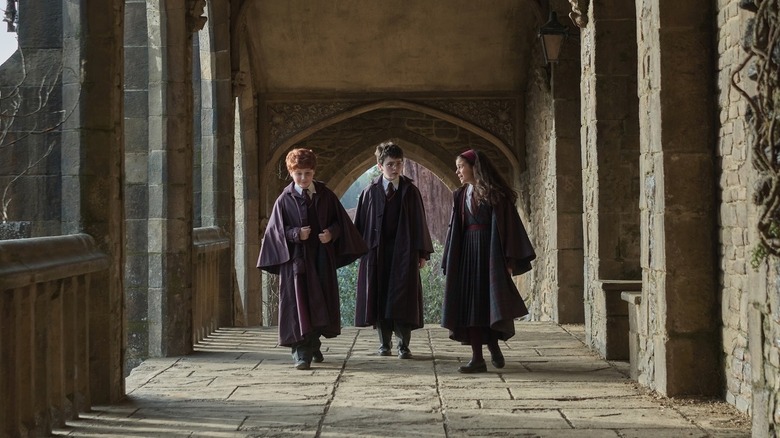 Ron Harry and Hermione walking down a hallway in Harry Potter and the Philosopher's Stone (2026)