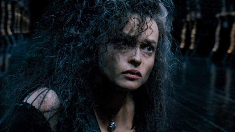 Bellatrix sits on the floor