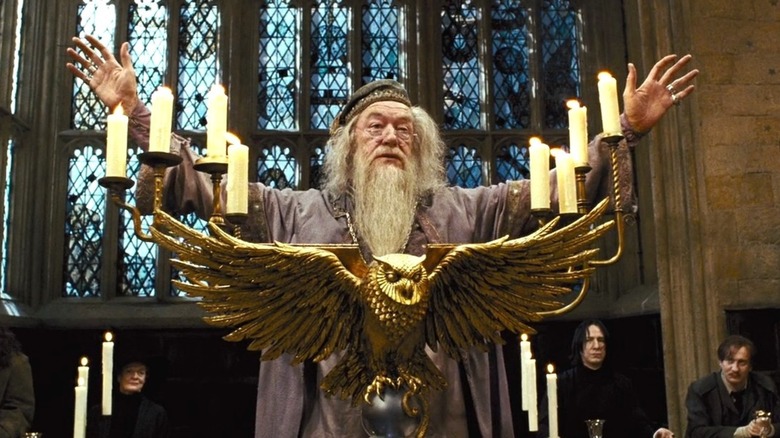 Dumbledore standing behind a lectern