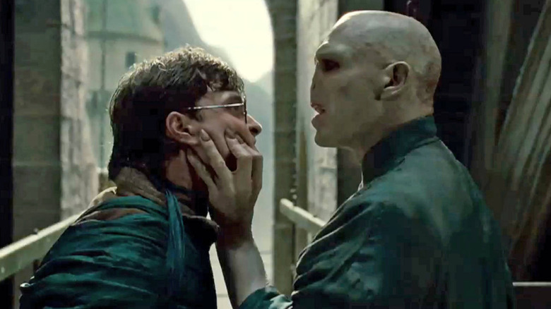 Voldemort grabbing Harry's face