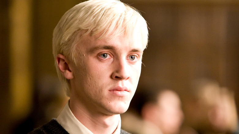Draco Malfoy staring intently