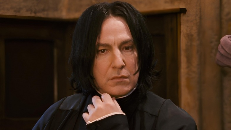 Severus Snape touching his chin