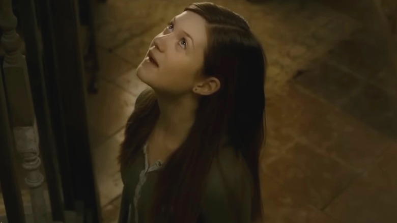 Ginny looking up in Burrow