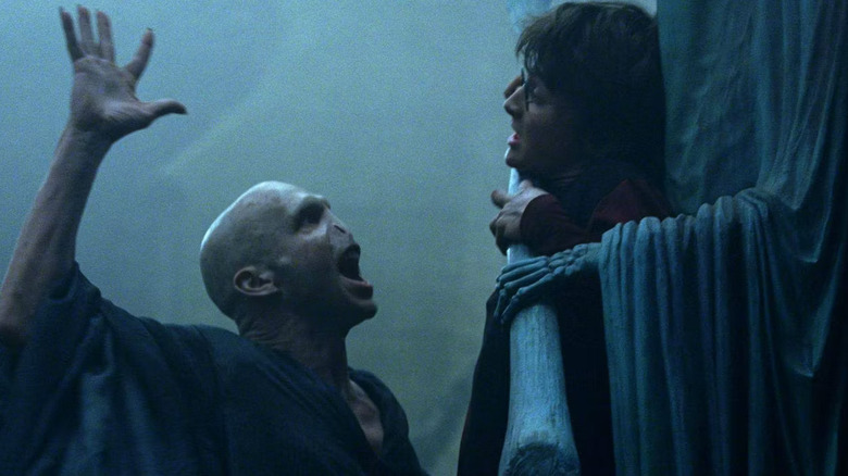 Voldemort raising hand Harry
