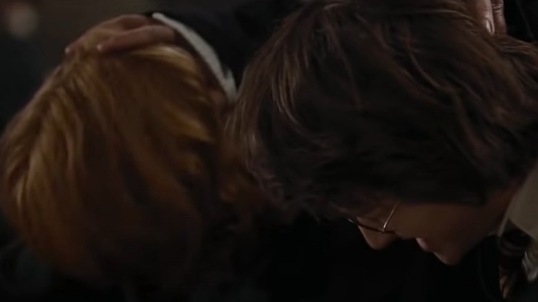 Snape pushes Harry Potter and Ron