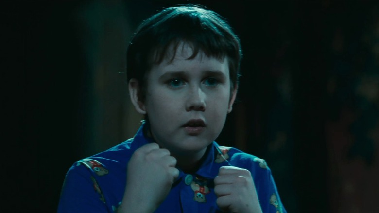 Neville Longbottom holding his hands up to fight in Harry Potter and the Philosopher's Stone