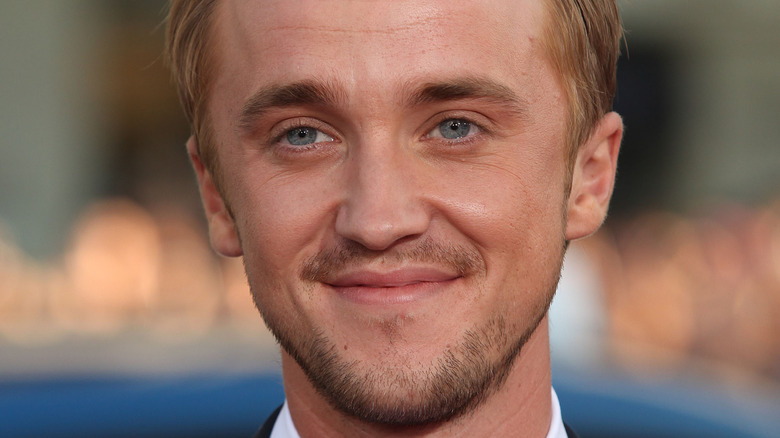 Tom Felton smiling