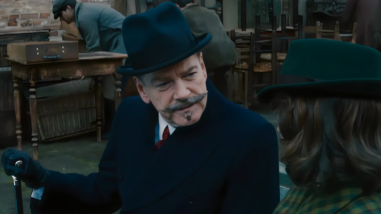 Hercule Poirot looks suspicious
