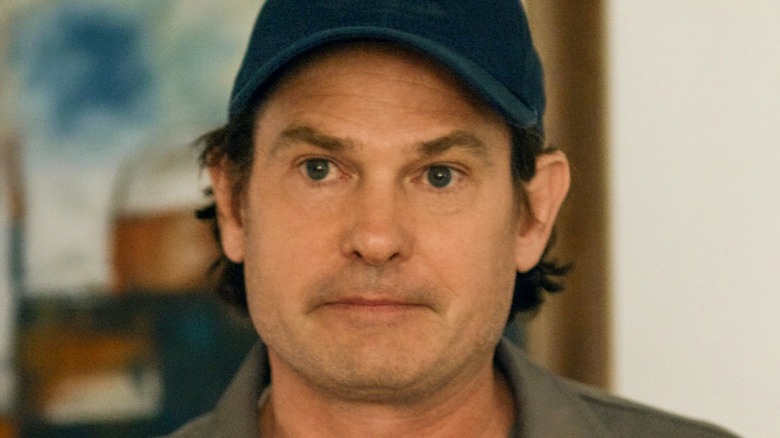 Henry Thomas frowning in "Crawlspace"