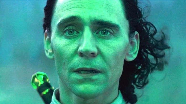 Tom Hiddleston as Loki in green light