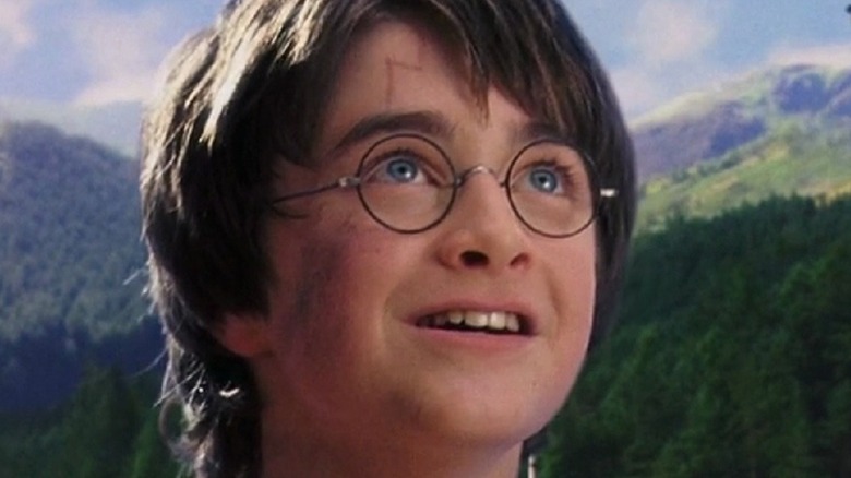 Young Harry Potter smiling