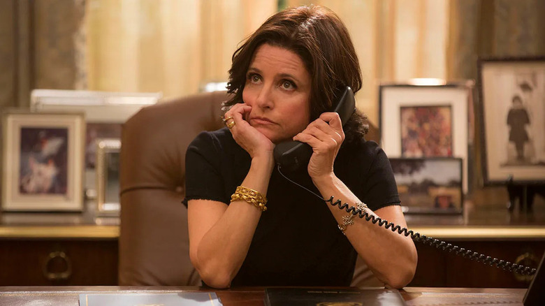Selina on the phone looking angry on Veep