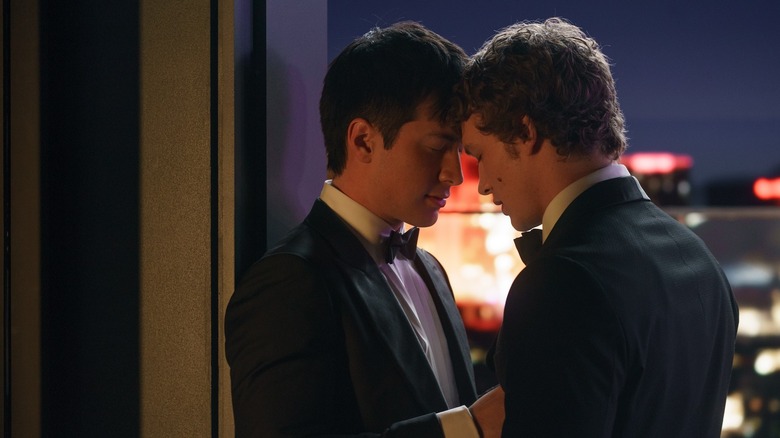 Shane and Ilya about to kiss on a balcony in Heated Rivalry