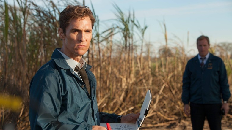 Rustin "Rust" Cole and Martin "Harty" Hart investigating a crime scene in "True Detective"