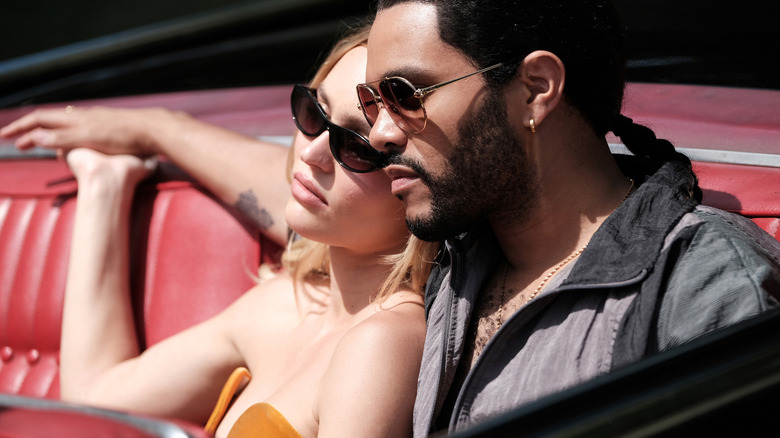 Jocelyn and Tedros in a car 