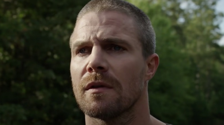 Heels star Stephen Amell staring