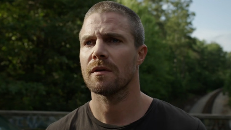 Stephen Amell staring