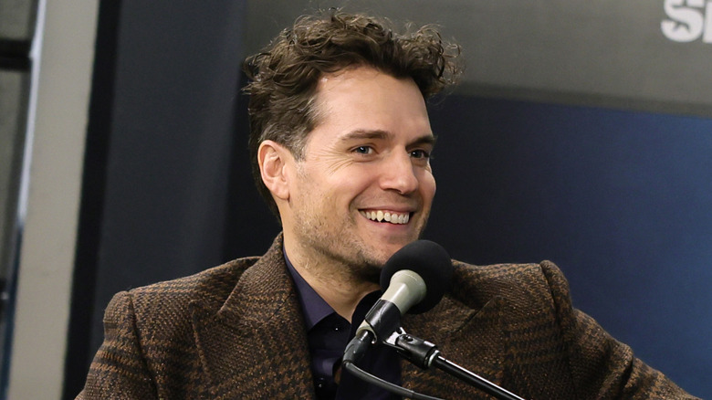 Henry Cavill at a microphone