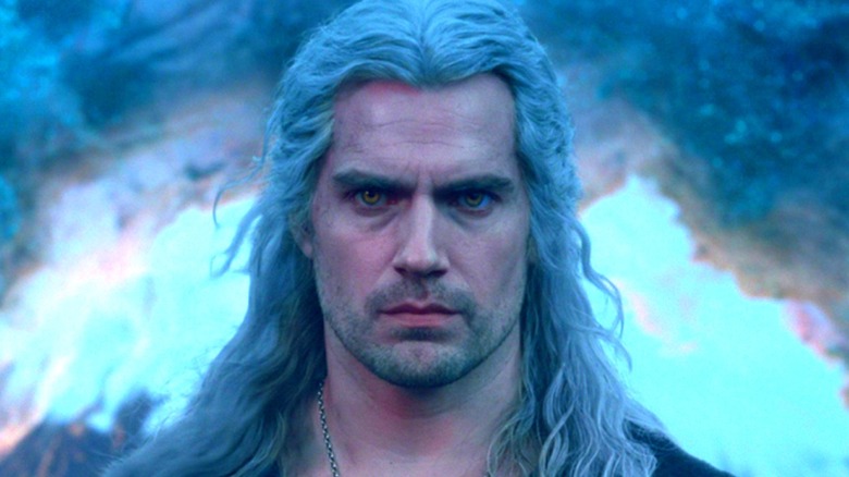 Geralt standing in front of a swirling cloud in 