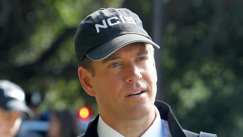 Tony DiNozzo wearing NCIS hat outside