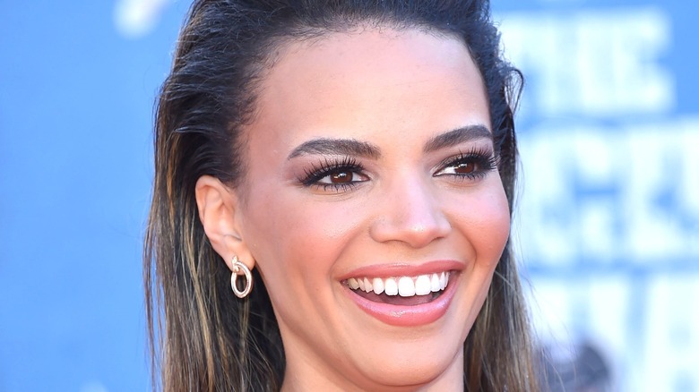 Leslie grace looking away smiling 