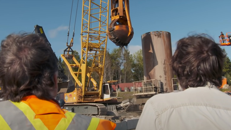 Rick and Marty Lagina watch heavy equipment
