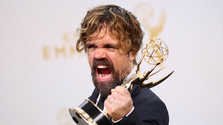 Peter Dinklage with an Emmy Award