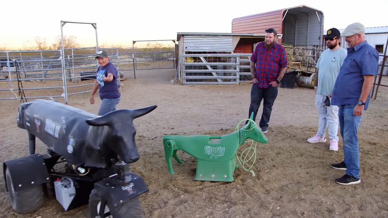 Rick admires roping dummies