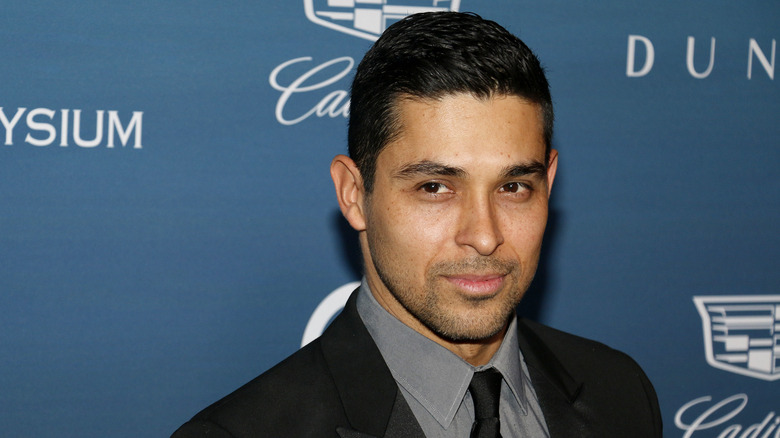 Wilmer Valderrama black suit