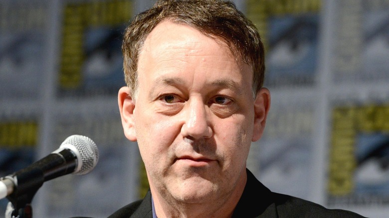 Sam Raimi addressing microphone