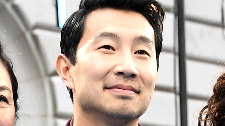 Simu Liu smiling