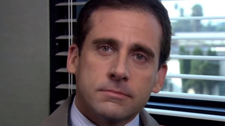 Michael Scott slightly tilting his head