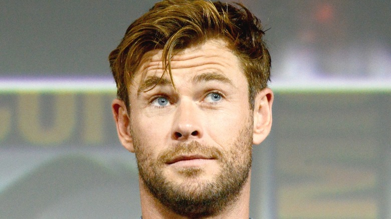 Chris Hemsworth looking up