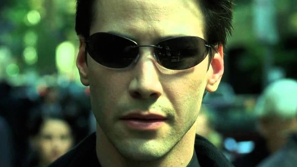 Neo in a crowd in the Matrix