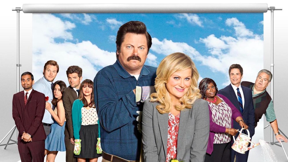 Leslie and Ron squeeze in to Parks and Rec cast photo