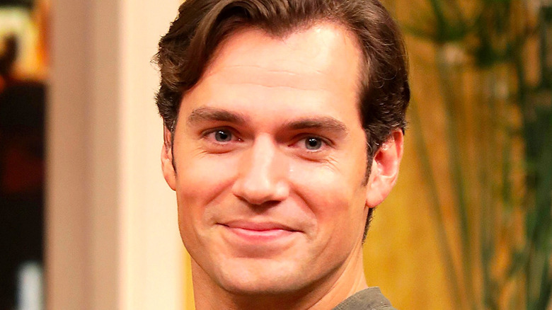 Henry Cavill smiling and clean shaven