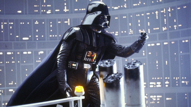 Darth Vader talking while holding out his fist in The Empire Strikes Back (1980)