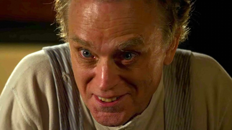 Brad Dourif as Adam Rain