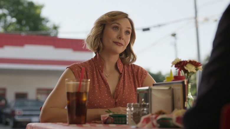 Candy Montgomery sitting at an outdoor table