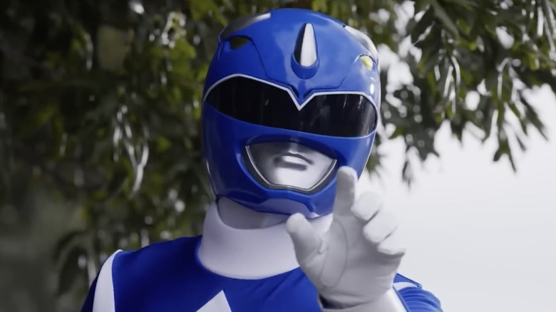 Blue Ranger reaching hand out