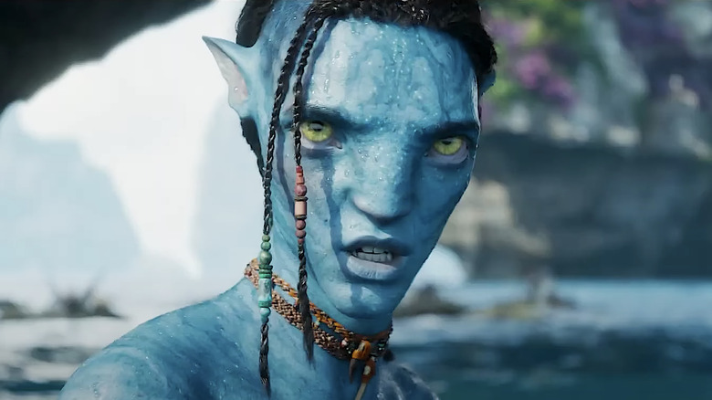 A blue na'vi warrior looking angry