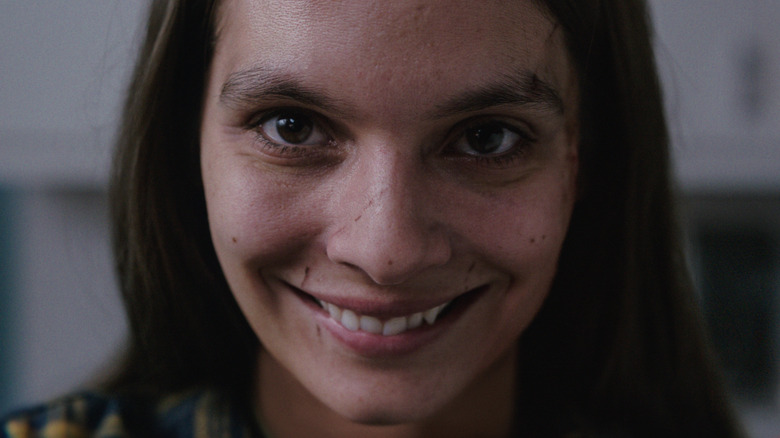 Caitlin Stasey creepy smile