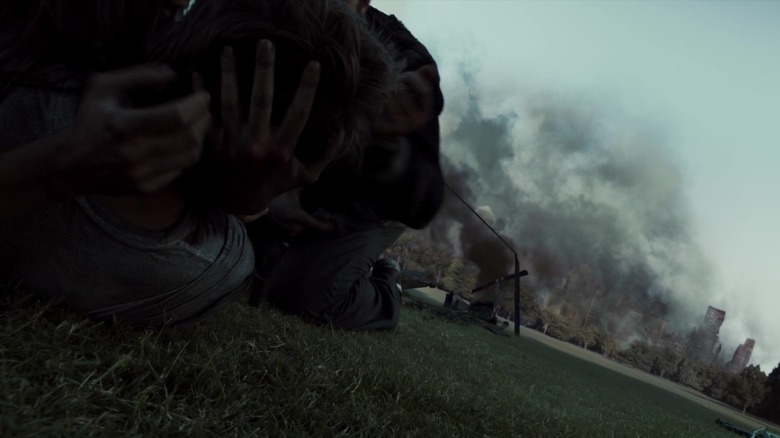 Character hiding from Cloverfield monster